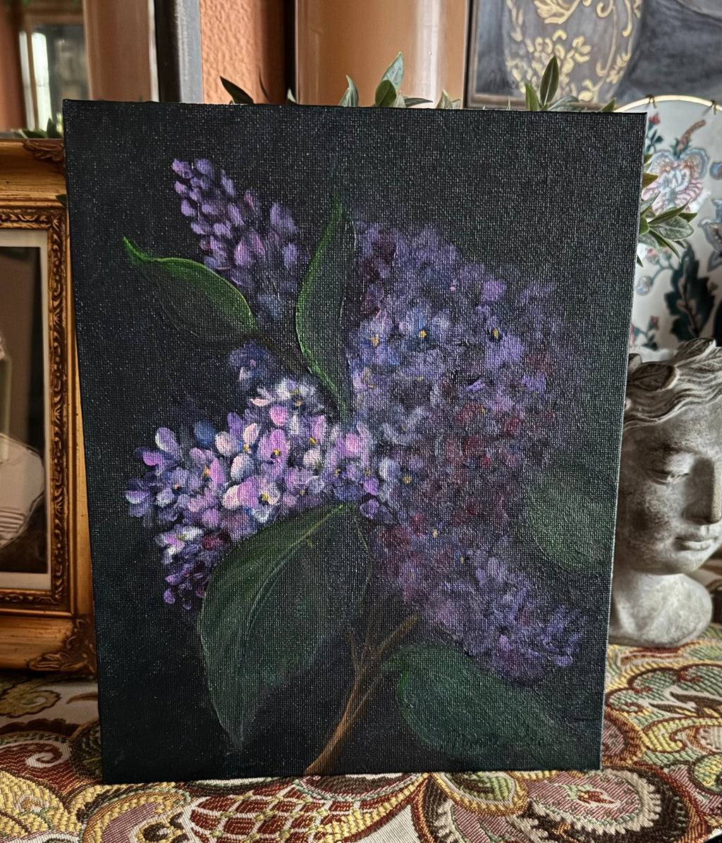 Original lilac painting with purple flowers and green leaves in soft chiaroscuro light