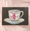 Small painting of teacup and saucer 