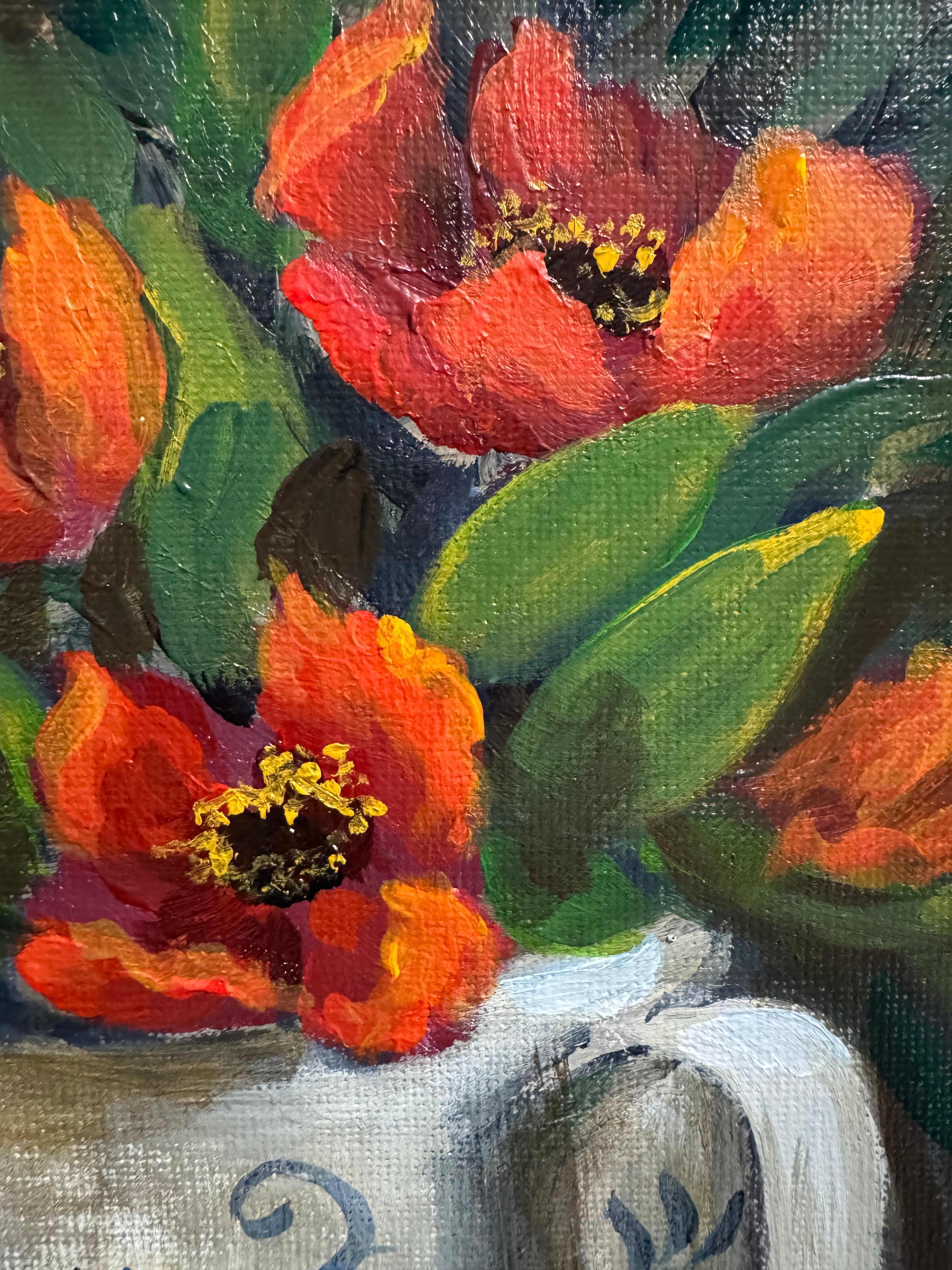 Original still life painting of red flowers in blue and white teacup with soft light